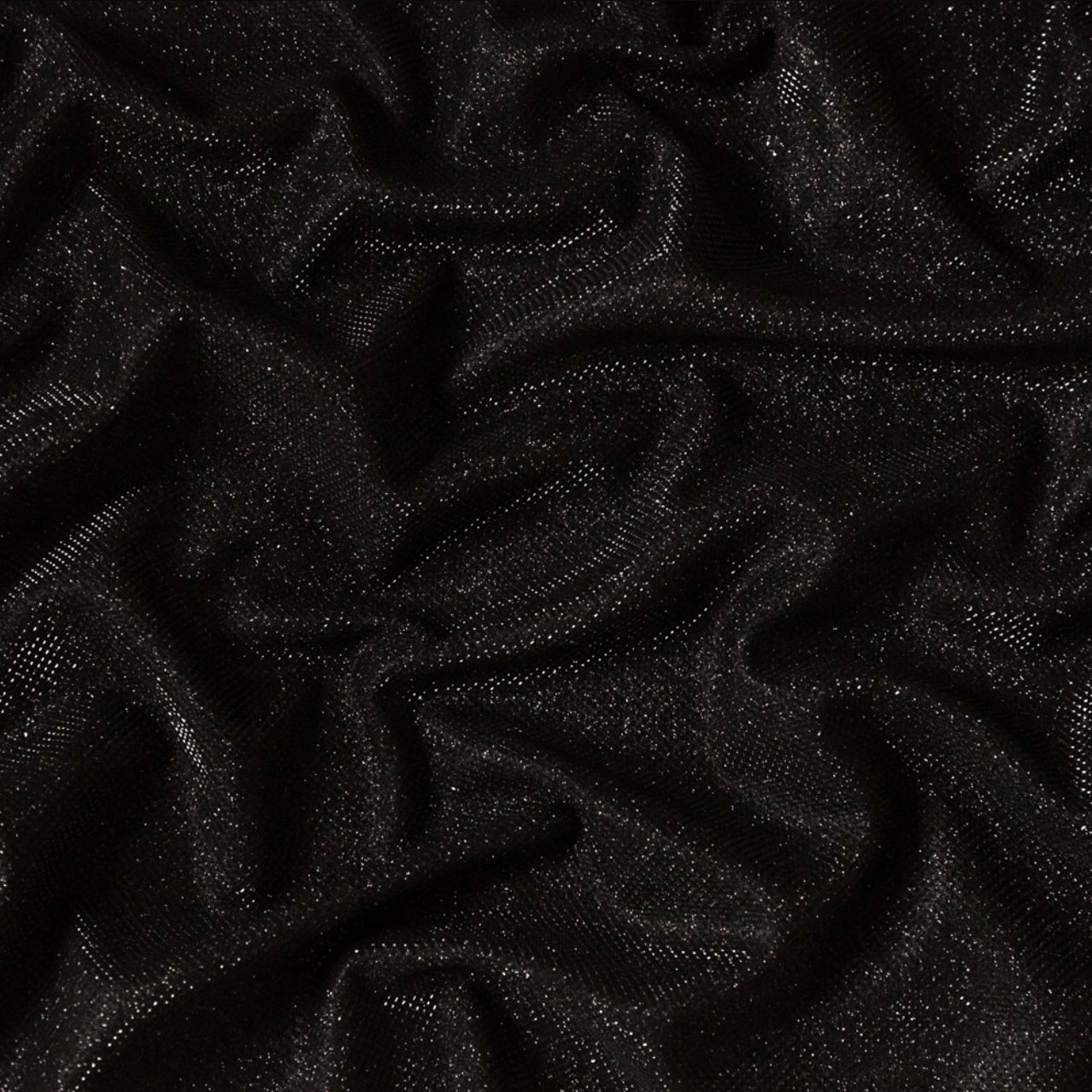 Close-up of sparkling lamé fabric on The Idol mini dress by INAMORE