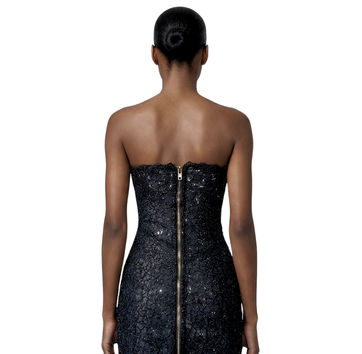 The Candy sheer guipure lace strapless mini dress with glitter accents, INAMORE body-forming cut, and full back zipper. Made-to-order in Miami for cocktail parties and night-out occasions.